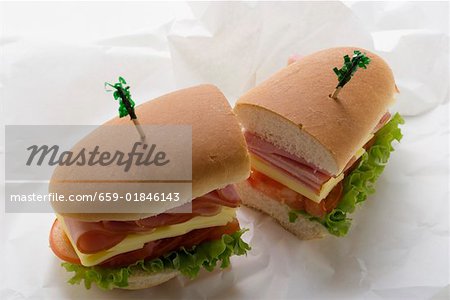 Sub sandwich, halved, on sandwich wrap