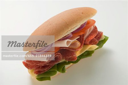 Salami, ham, cheese and salad sandwich