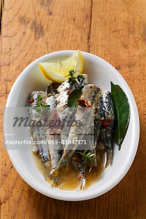 Fried anchovies with dried tomatoes (Calabria)