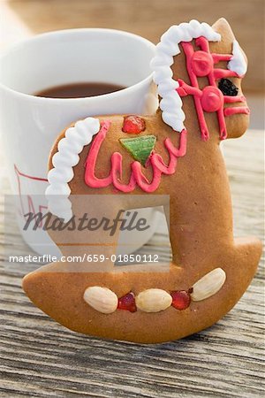 Gingerbread rocking horse and mug of cocoa