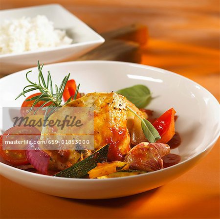 Braised chicken breast with summer vegetables