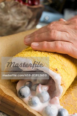 Rolling up a sponge roulade