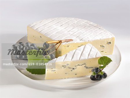 Blue cheese with black grapes