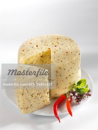 Tilsiter cheese with herbs and chilli