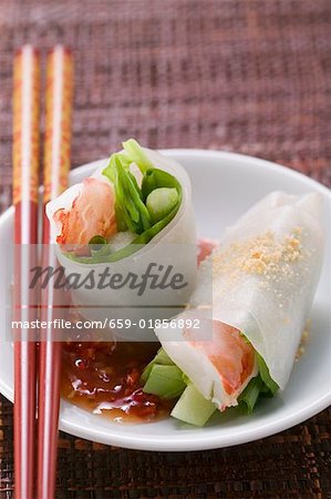 Vietnamese spring rolls with asparagus, shrimps, chili sauce