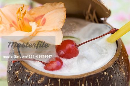 Pina Colada with flower and cherries