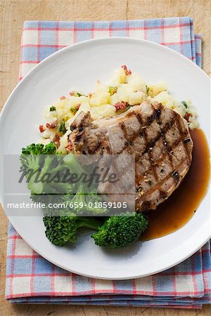 Pork chop with broccoli and mashed potato