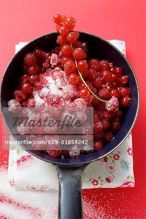 Sugared redcurrants in a pan