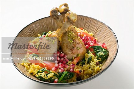 Cuisses de poulet avec des graines de riz et de Grenade au safran