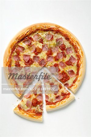 Ham, cheese and tomato pizza (partly sliced)