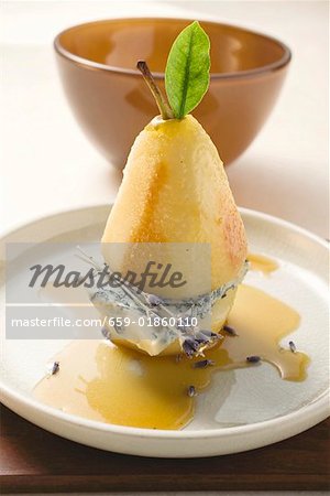 Poached pear with blue cheese and lavender flowers