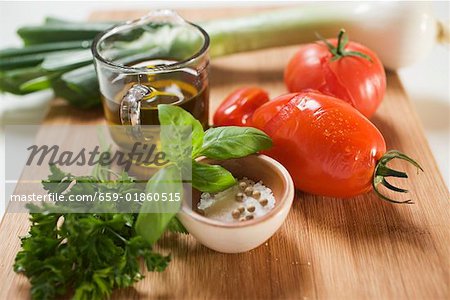 Ingredients for tomato sauce: tomatoes, herbs, olive oil, spices