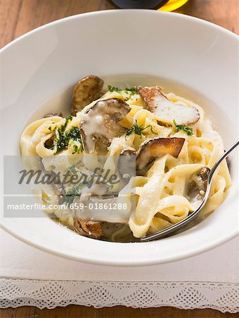 Tagliatelle with ceps, herbs and cream sauce