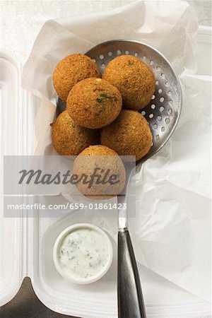 Falafel (chick-pea balls) with yoghurt dip in lunch box