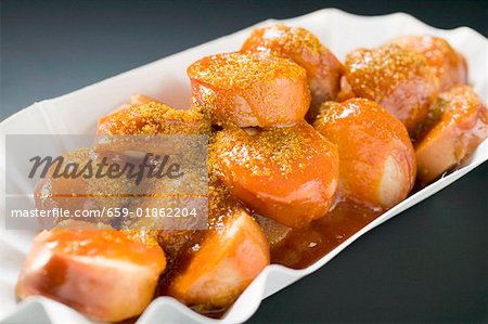 Currywurst (sausage with ketchup & curry powder) in paper dish