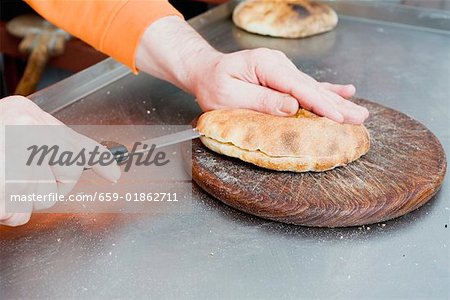 Splitting pita bread
