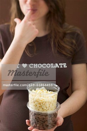 Woman eating chocolate chips