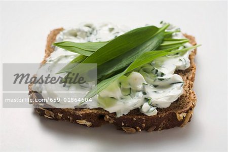 Quark and ramsons (wild garlic) on wholemeal bread