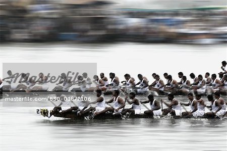 Group of people participating in a snake boat racing, Kerala, India