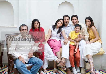 Portrait of a group of people sitting together and smiling