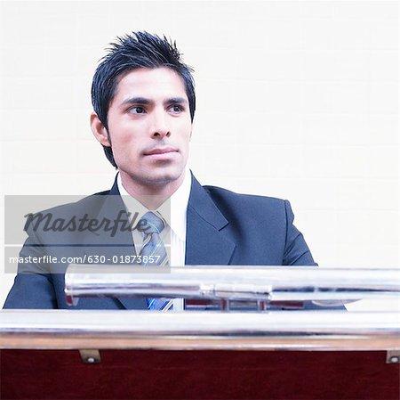 Close-up of a businessman at a lectern