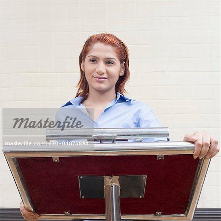 Close-up of a businesswoman at a lectern