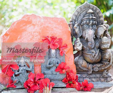 Close-up a statue of God Ganesha with Goddess Durga