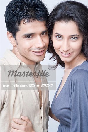 Portrait of a young couple smiling