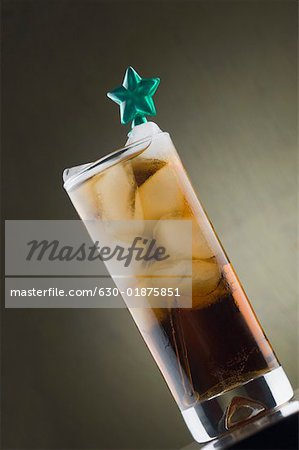 Close-up of a stirrer in a glass of ice tea