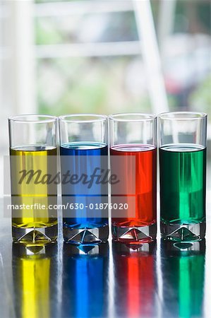 Close-up of four glasses of mocktail