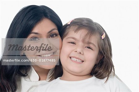 Portrait of a mid adult woman smiling with her daughter