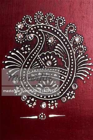 Close-up of a design on a wedding invitation card