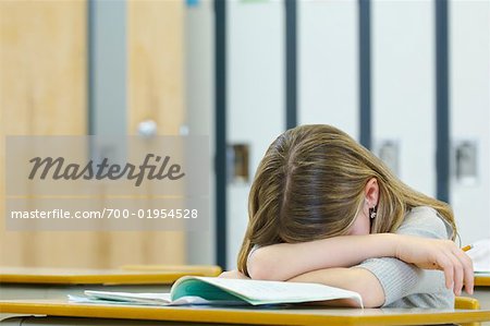 Student Resting Head on Desk