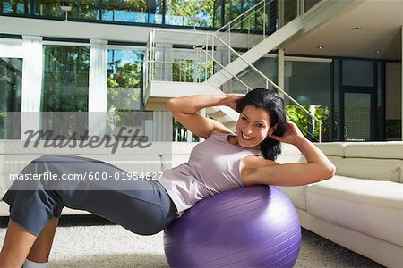 Woman Exercising in Living Room