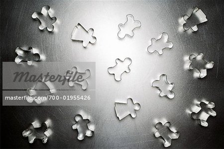 Scattered Gingerbread Men and Gingerbread Women Cookie Cutters