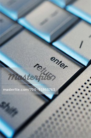 Close-up of Enter Button on Computer Keyboard