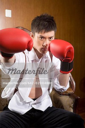 one man with boxing gloves