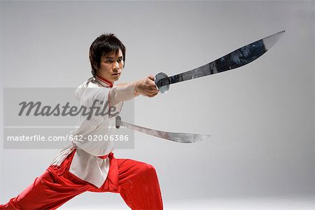 a practicing two Chinese swords