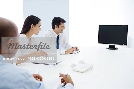 Group of executives having teleconference