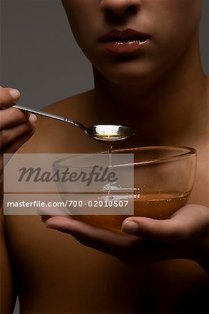 Woman with Bowl of Honey