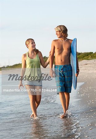 Couple Walking on the Beach, South Florida, Florida, USA