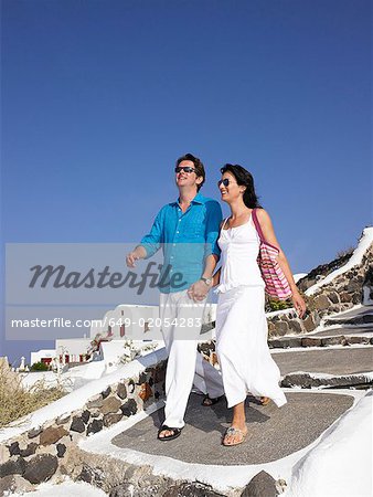 Couple climbing down the stairs