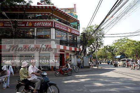 People on Mopeds in Street, Ho Chin Minh City, Vietnam