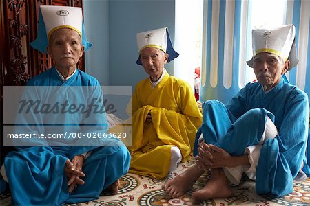 Priests in Cao Dai Temple, Tay Ninh, Vietnam