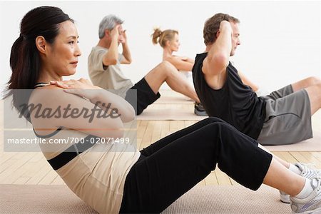 People Exercising in Studio