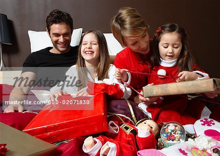 Family Opening Christmas Presents