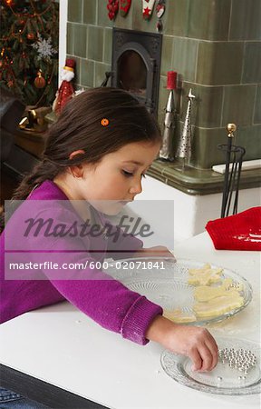 Girl Making Christmas Cookies