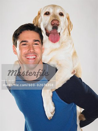 Portrait of Man with Labrador Retriever