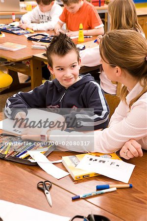 Teacher Helping Student
