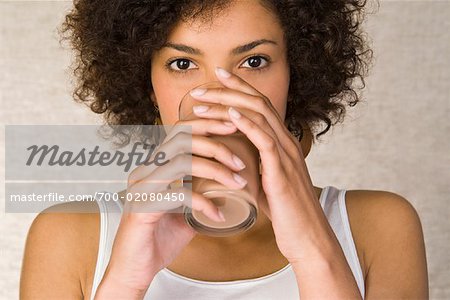 Portrait of Woman Drinking Chocolate Milk